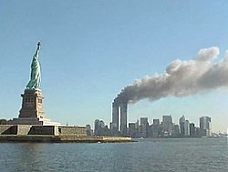 https://upload.wikimedia.org/wikipedia/commons/thumb/f/fd/National_Park_Service_9-11_Statue_of_Liberty_and_WTC_fire.jpg/250px-National_Park_Service_9-11_Statue_of_Liberty_and_WTC_fire.jpg